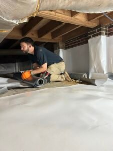 plumber fixing a drain