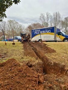 ethical plumbing van repairing septic system