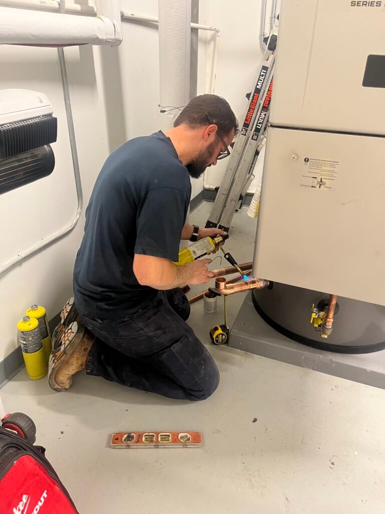 plumber doing maintenance