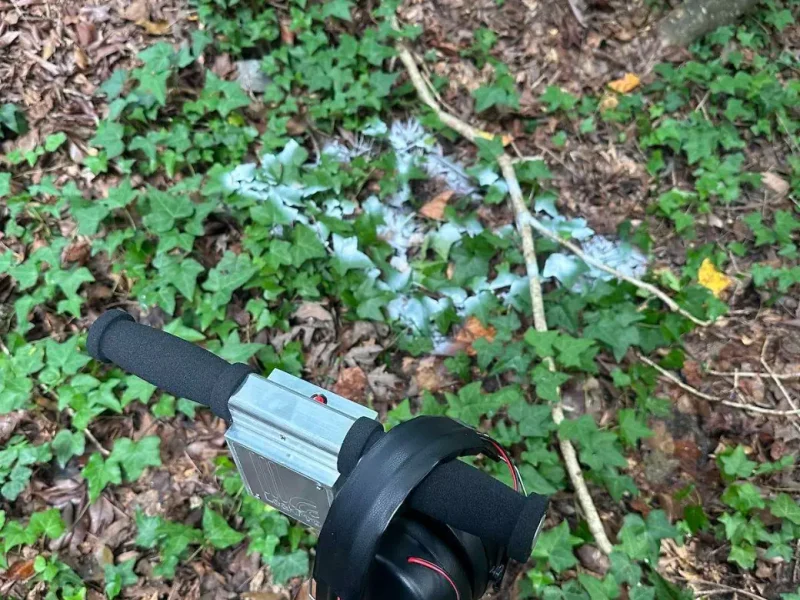 Drain cleaning hose at an outdoor sewer cleanout