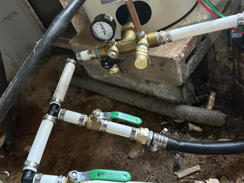 New well tank piping with shutoff valves and pressure switch