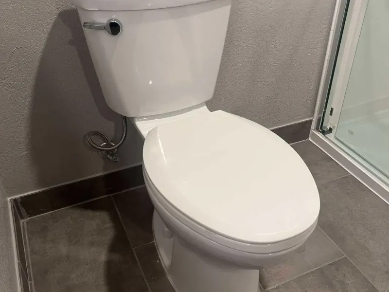 New toilet installed in a renovated hotel bathroom