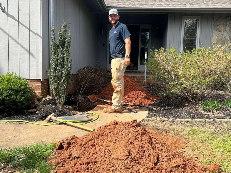 Ethical Plumbing plumber at a customer's home during a water line repair